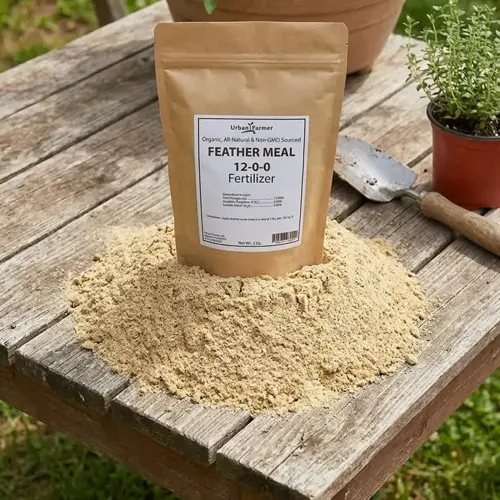 bag of feather meal fertilizer with powder spilled on a garden table beside a trowel